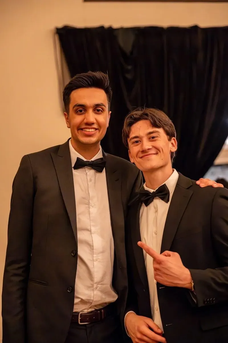 Two brothers in bow ties at the 10th Annual Banquet
