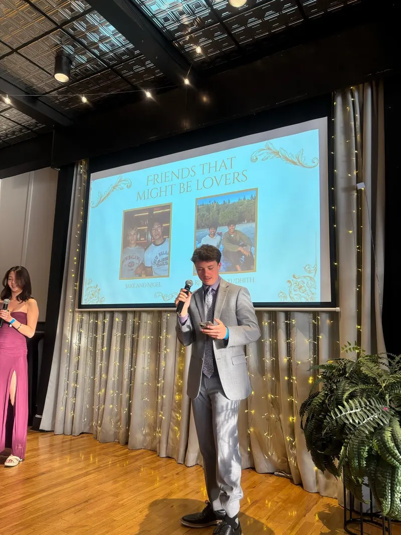 A brother speaking on stage at Banquet 2026
