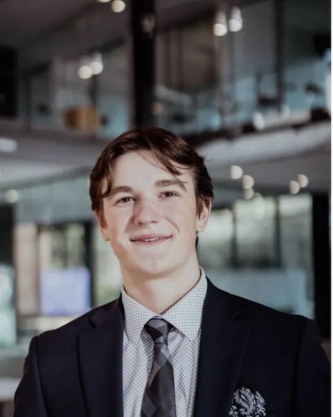 Headshot of Kai Hutchison